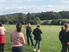 Jonathan Parsons discusses his work, 'Fossil Ocean Floor', before a picnic audience at Milton Court Farm, Courtesy Hugh Broom and Alison Clarke (Surry Hills Arts)